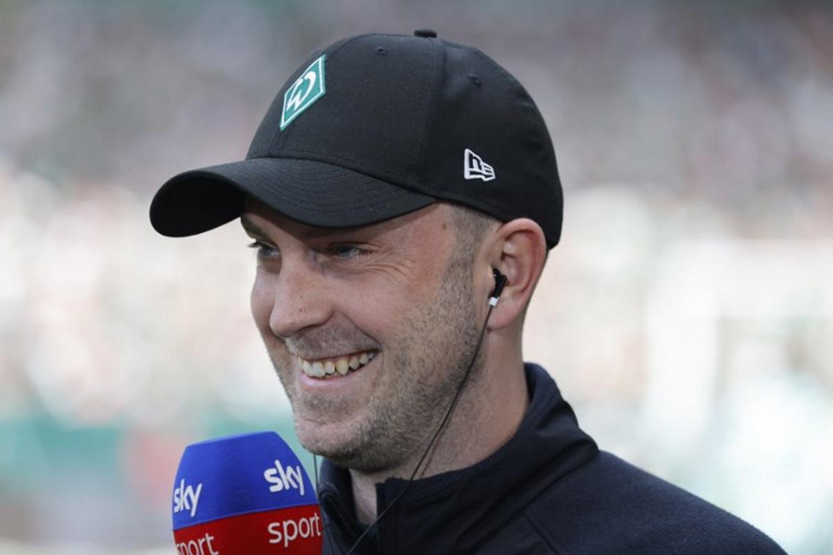 Bremen's German head coach Ole Werner head coach Zsolt Loew speaks to the media prior to the start of the German first division Bundesliga football match between SV Werder Bremen and RB Leipzig in Bremen, northern Germany on May 10, 2025.  Focke Strangmann / AFP