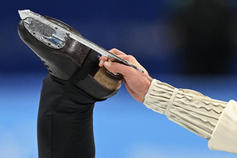 Latvia's Deniss Vasiljevs competes in the men's single skating free skating of the figure skating event during the Beijing 2022 Winter Olympic Games at the Capital Indoor Stadium in Beijing on February 10, 2022.  WANG Zhao / AFP