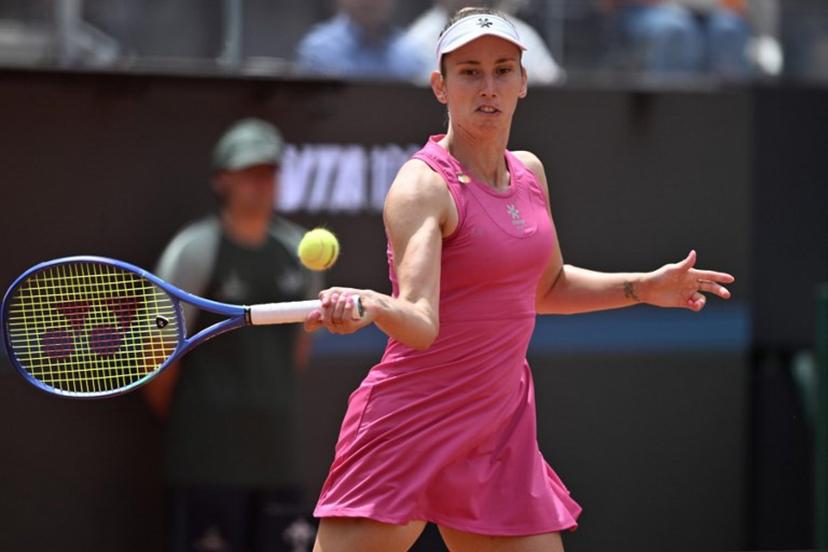 Belgium's Elise Mertens hits a return to Italy's Jasmine Paolini during the WTA Rome Open tennis tournament at Foro Italico in Rome on May 9, 2026.   Tiziana FABI / AFP