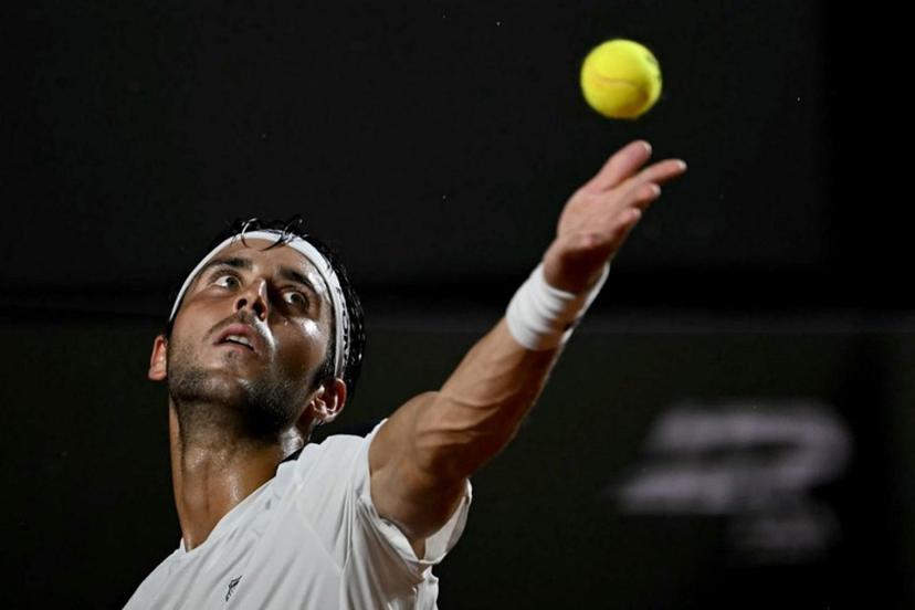 Argentina's Tomas Etcheverry serves against Chile's Alejandro Tabilo during their men's singles final match at the Rio Open tennis tournament in Rio de Janeiro, Brazil, on February 22, 2026.  Mauro PIMENTEL / AFP
