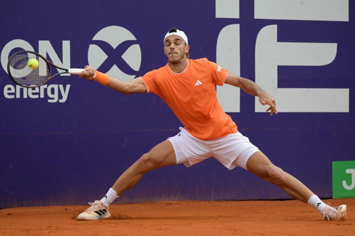 Argentina's Francisco Cerundolo returns the ball to Italy's Luciano Darderi (not in frame) during their ATP 250 Argentina Open final match in Buenos Aires on February 15, 2026.  JUAN MABROMATA / AFP