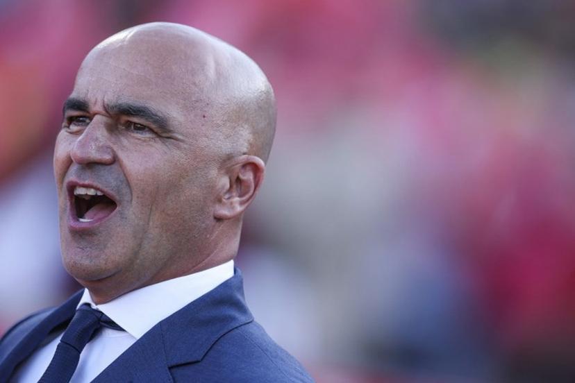 Portugal's Spanish coach Roberto Martinez sings the national anthem before the international friendly football match between Portugal and Chile at Estadio Nacional do Jamor in Oeiras, on June 6, 2026.  PATRICIA DE MELO MOREIRA / AFP