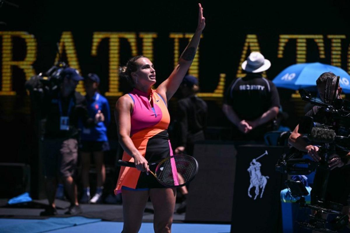 Belarus' Aryna Sabalenka celebrates beating Austria's Anastasia Potapova in their women's singles match on day six of the Australian Open tennis tournament in Melbourne on January 23, 2026.  WILLIAM WEST / AFP