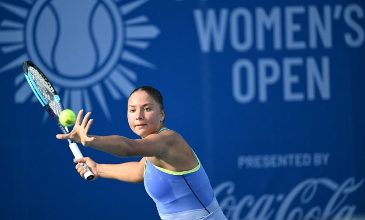 Sofia Costoulas of Belgium hits a return against Tatiana Prozorova of Russia during the women's singles at the Philippine Women's Open tennis tournament in Manila on January 29, 2026.  Ted ALJIBE / AFP