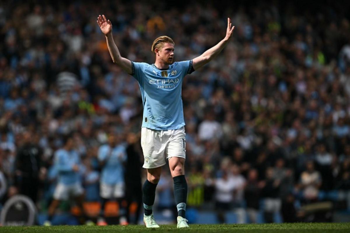 Manchester City's Belgian midfielder #17 Kevin De Bruyne reacts as he is substituted during the English Premier League football match between Manchester City and Crystal Palace at the Etihad Stadium in Manchester, north west England, on April 12, 2025.  Paul ELLIS / AFP