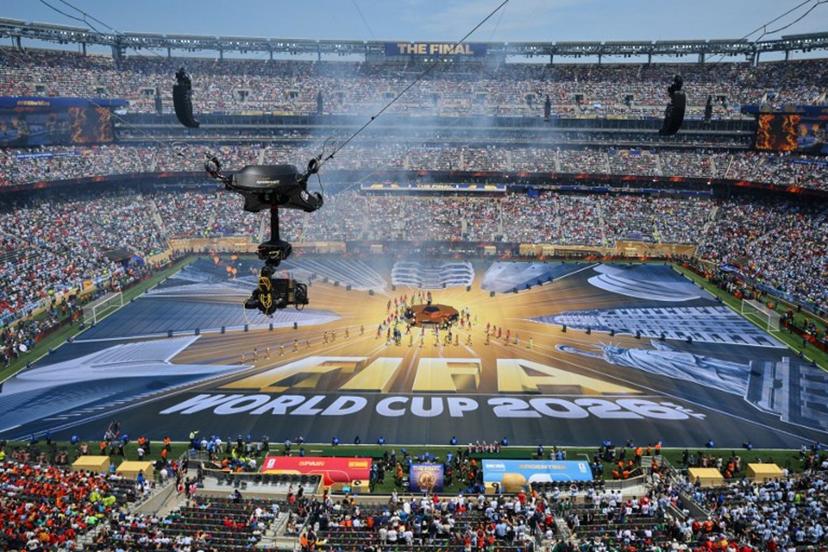 A general view shows spectators watching dancers and musicians performing during the closing ceremony of the 2026 World Cup football tournament final match between Spain and Argentina at the New York/New Jersey Stadium in East Rutherford on July 19, 2026.   ANGELA WEISS / AFP