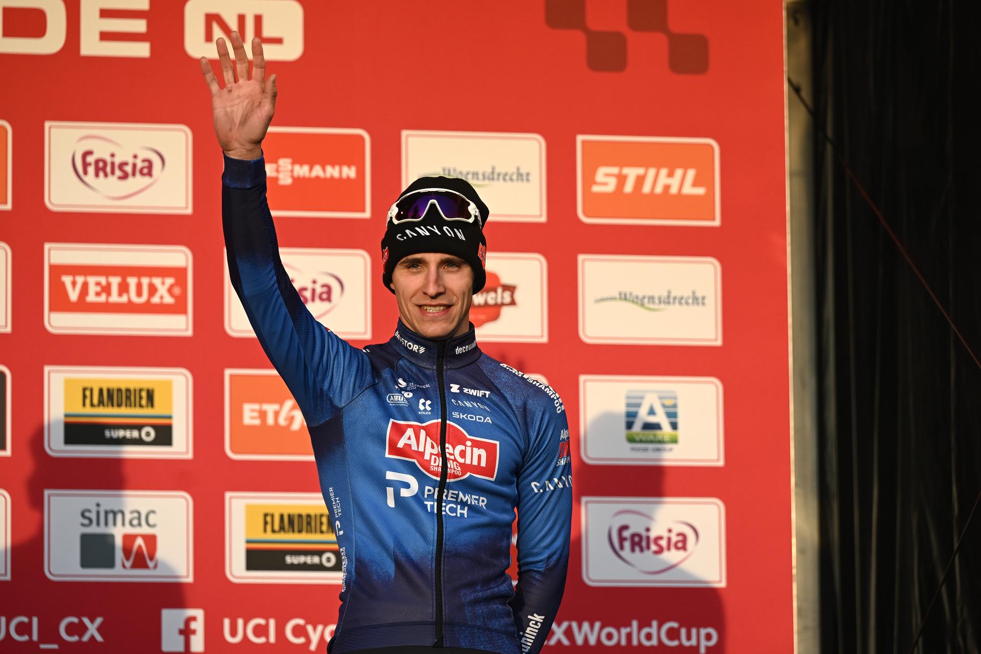 Belgian Niels Vandeputte celebrates on the podium after the men's elite race at the World Cup cyclocross cycling event in Hoogerheide, Netherlands, stage 12 (out of 12) of the UCI World Cup cyclocross competition, Sunday 25 January 2026. BELGA PHOTO LUC CLAESSEN