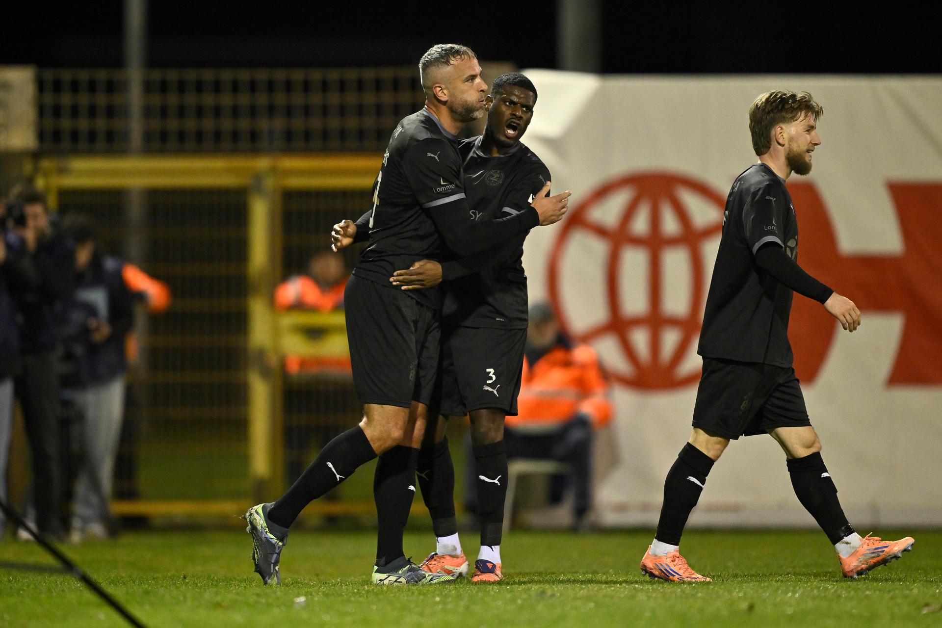Lommel's Ralf Seuntjens and Lommel's Joel Eyoma celebrate after scoring during a soccer game between Jong Genk and Lommel SK, Friday 16 January 2026 in Geel, on day 20 (out of 30) of the 2025-2026 'Challenger Pro League' 1B second division of the Belgian championship. BELGA PHOTO JOHAN EYCKENS