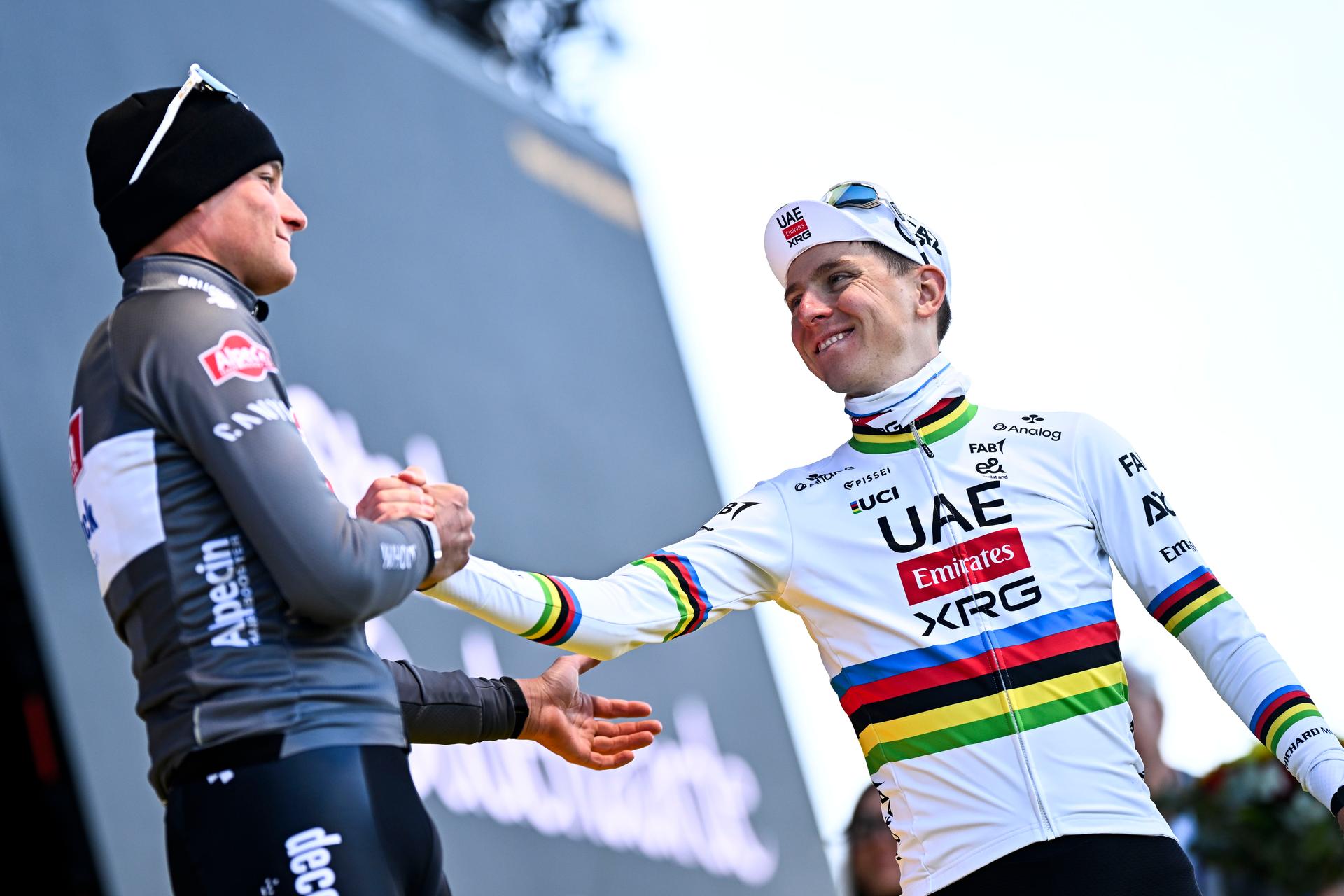 Dutch Mathieu van der Poel of Alpecin-Deceuninck and Slovenian Tadej Pogacar of UAE Team Emirates pictured on the podium after the men's race of the 'Ronde van Vlaanderen/ Tour des Flandres/ Tour of Flanders' one day cycling race, 268,9km from Brugge to Oudenaarde, Sunday 06 April 2025. BELGA PHOTO JASPER JACOBS