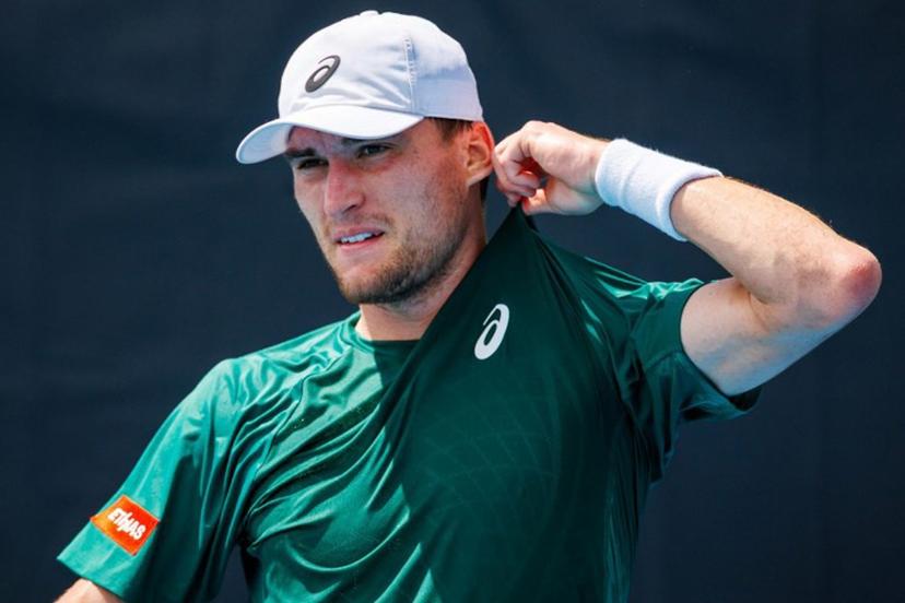 Belgium's Raphael Collignon reacts while playing against USA's Ethan Quinn during their men's singles match at the Brisbane International tennis tournament in Brisbane on January 4, 2026.   Patrick HAMILTON / AFP