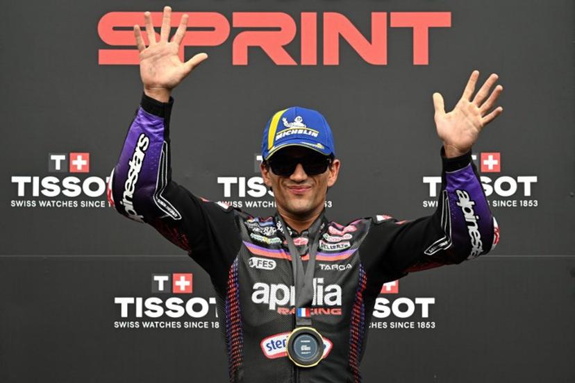 Aprilia Racing's Spanish rider Jorge Martin celebrates on the podium after winning the Moto GP Grand Prix of France Sprint race at Le Mans, northwestern France, on May 9, 2026.  Loic VENANCE / AFP