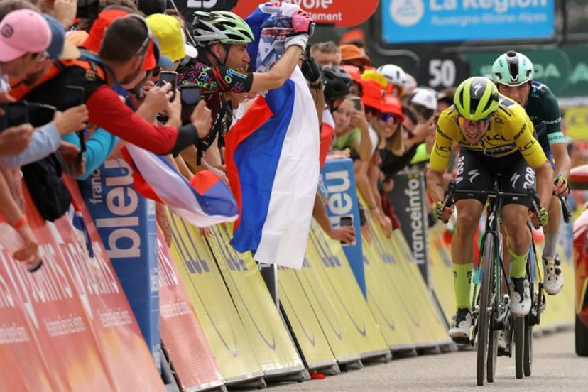Team Bora's Slovenian rider Primoz Roglic wearing the overall leader's yellow jersey cycles ahead of Team Lidl-Trek's Italian rider Giulio Ciccone wearing the sprinter's green jersey to the finish line of the eighth and last stage of the 76th edition of the Criterium du Dauphine cycling race, 160,6km between Thones and Plateau des Glieres, near Thorens-Glieres, French Alps, on June 9, 2024.  Thomas SAMSON / AFP