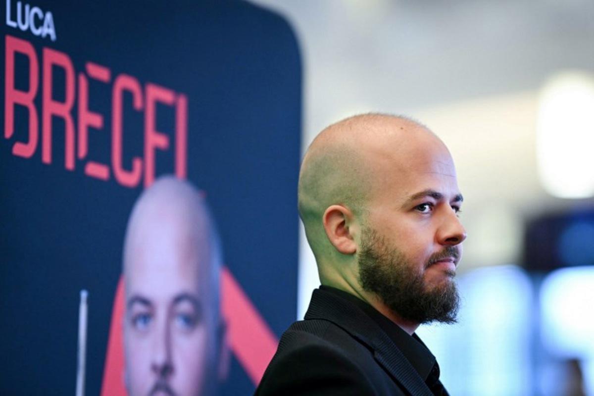 Belgian snooker player Luca Brecel speaks to the press during the media day launching the start of the World Snooker Championship 2025 at Crucible Theatre on April 18, 2025 in Sheffield, northern England. The World Snooker Championship 2025 will take place from April 19 to May 5, 2025. Oli SCARFF / AFP
