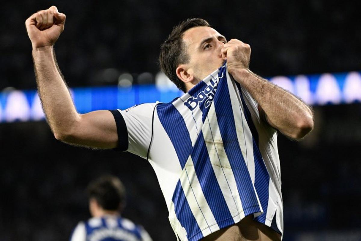 Real Sociedad's Spanish forward #10 Mikel Oyarzabal celebrates scoring his team's first goal from the penalty spot during the Copa del Rey (King's Cup) semi final second leg football match between Real Sociedad and Athletic Club Bilbao at thep Anoeta Stadium in San Sebastian on March 4, 2026.   ANDER GILLENEA / AFP