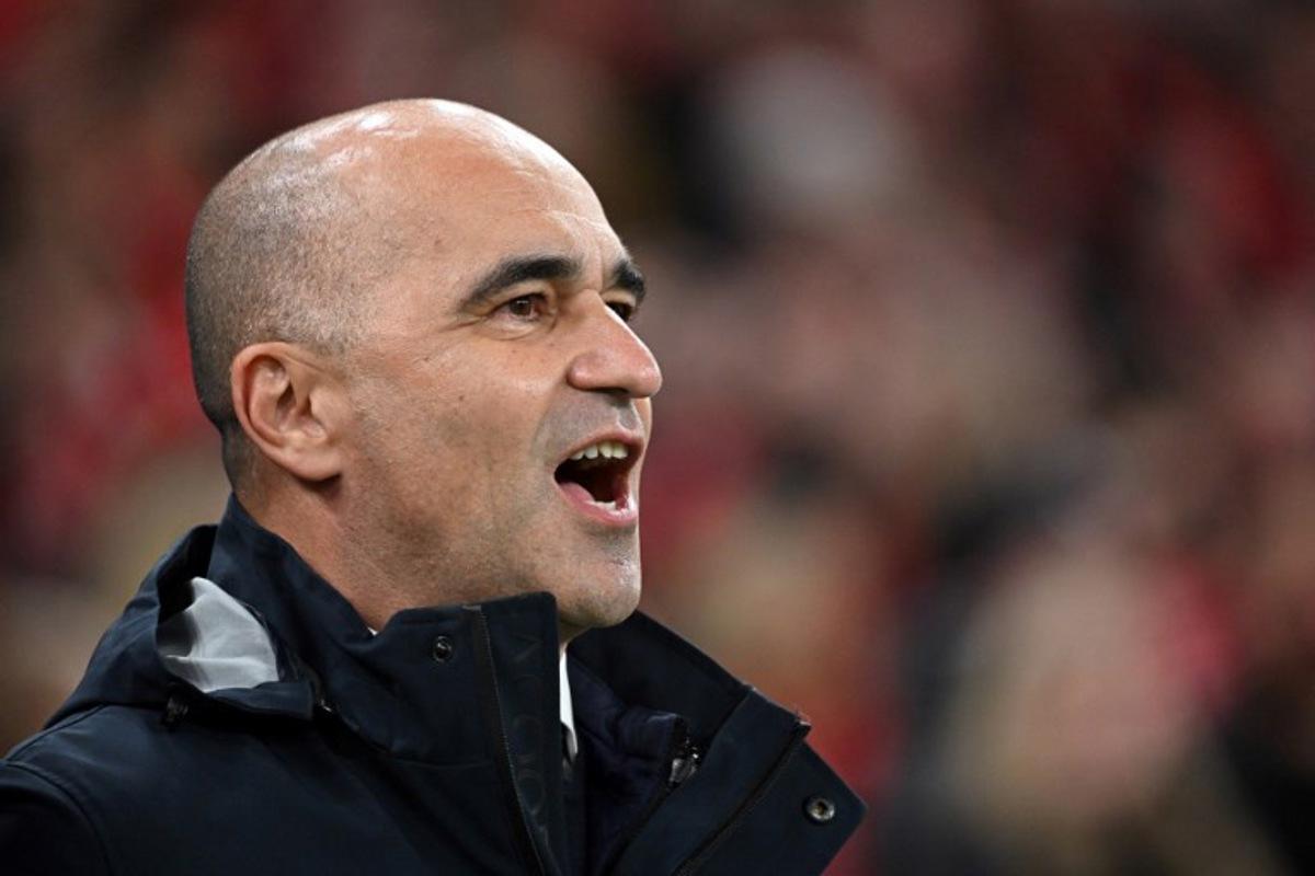 Portugal's Spanish head coach Roberto Martinez reacts during the UEFA Nations League quarter-final, first-leg football match Denmark v Portugal at the Parken Stadium in Copenhagen on March 20, 2025.   Jonathan NACKSTRAND / AFP