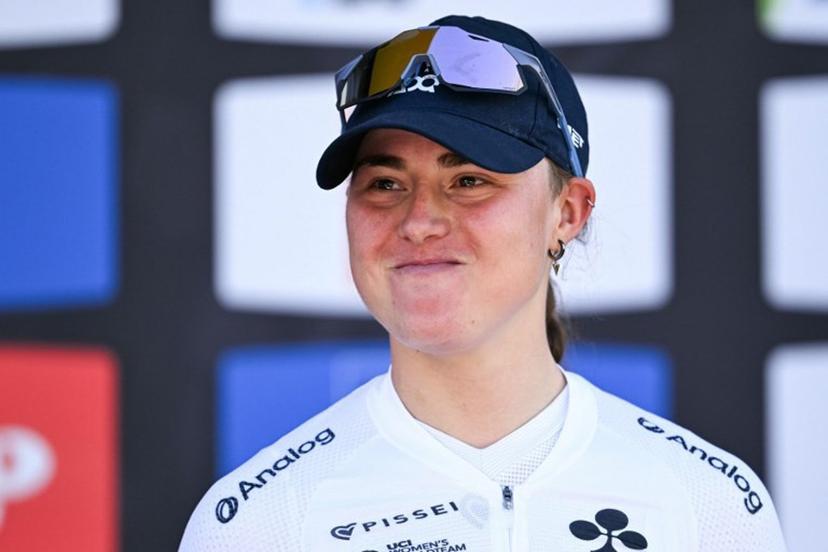 (FILES) Third-placed UAE Team ADQ's Spanish Paula Blasi celebrates on the podium after 'La Fleche Wallonne' one day cycling race, 141 km from Huy to Huy, on April 22, 2026. The Women's Vuelta a España starts on May 3, 2026 its toughest edition with a climb to the mythical Angliru, which will test the riders and the great favorite, the French Pauline Ferrand-Prevot, current champion of the Tour de France. JOHN THYS / AFP
