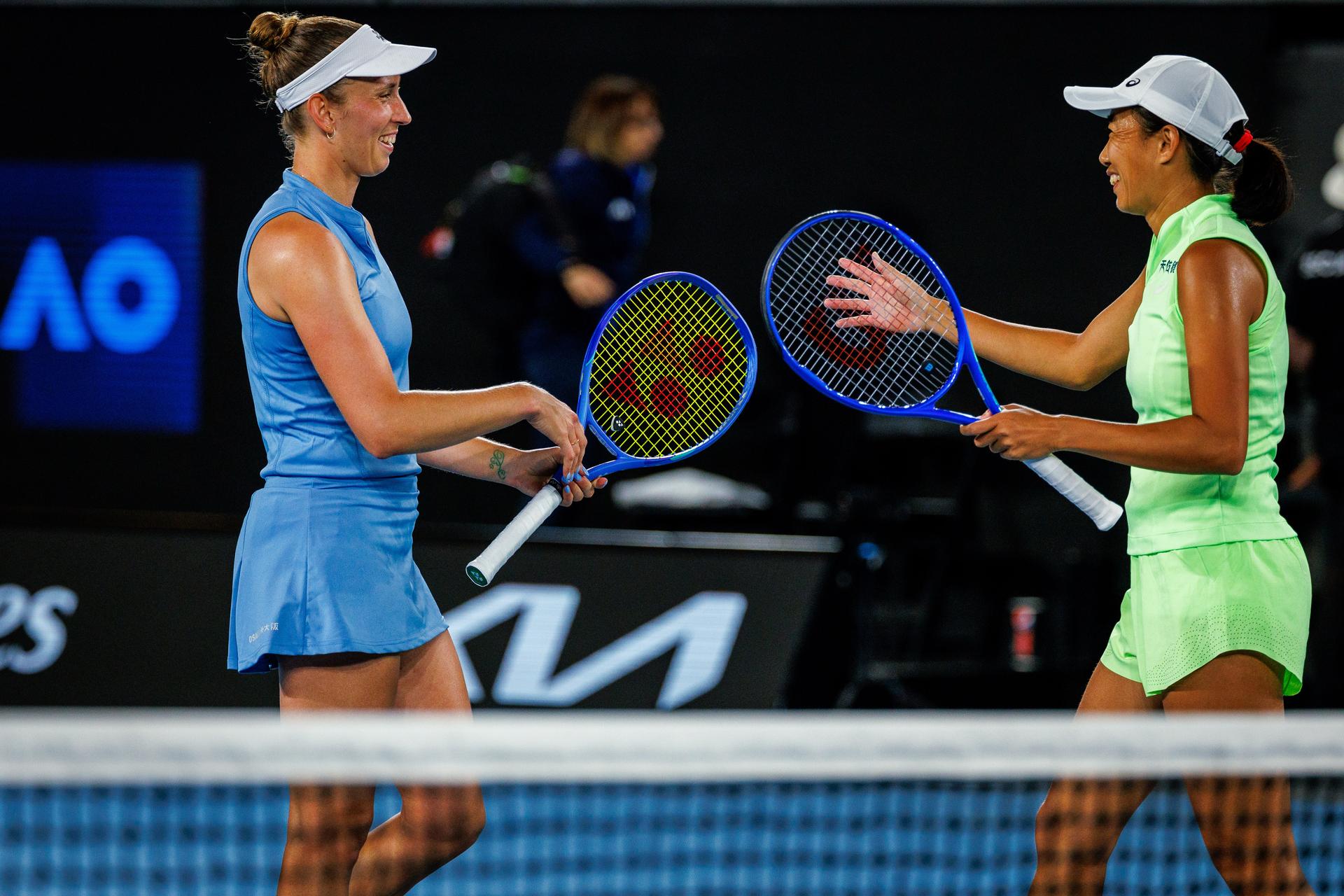 Belgian Elise Mertens and Chinese Zhang Shuai celebrate at a doubles tennis match against Japan/Neutral pair Shibahara-Zvonareva, in the semi-finals of the women doubles at the Australian Open, Melbourne Park, Melbourne on Thursday 29 January 2026. Mertens - Zhang won the game 6-3, 6-2. BELGA PHOTO PATRICK HAMILTON  --- BENELUX ONLY   ---