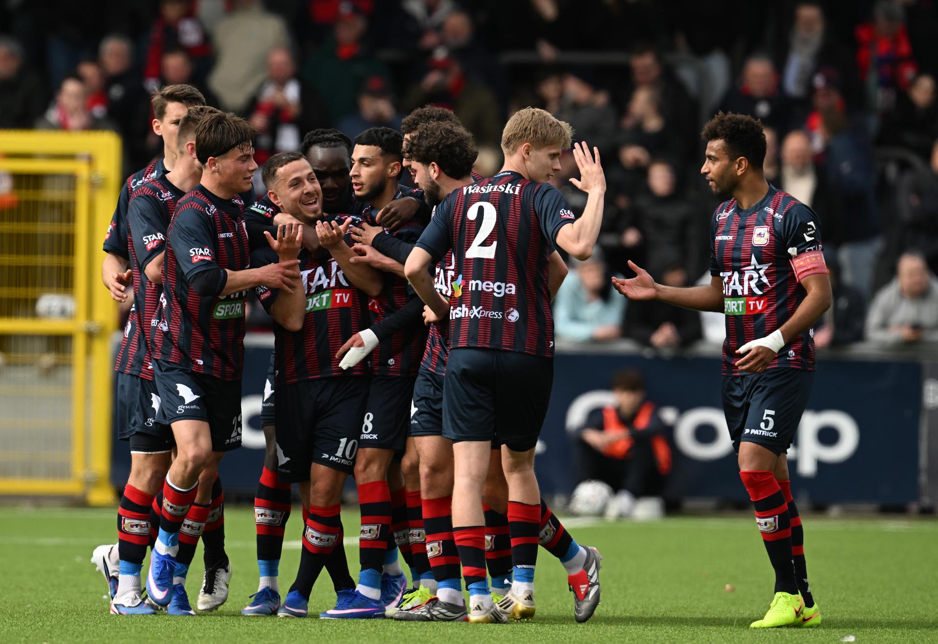Liege's Kylian Hazard celebrates after scoring during a soccer game between RFC Liege and Royal Olympic Charleroi, Sunday 05 April 2026 in Liege, on day 32 of the 2025-2026 'Challenger Pro League' 1B second division of the Belgian championship. BELGA PHOTO JOHN THYS