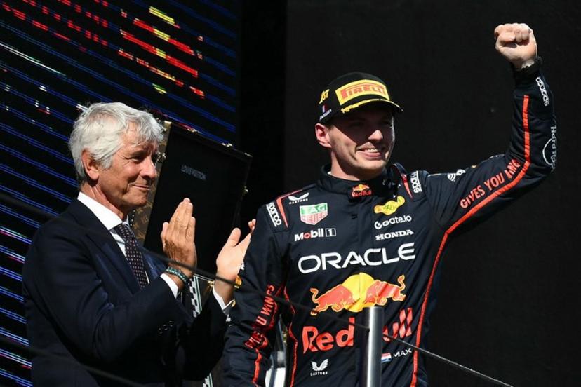 Red Bull Racing's Dutch driver Max Verstappen celebrates on the podium after winning the 2025 Emilia Romagna Formula One Grand Prix at the Imola autodrome in Imola, on May 18, 2025.   Marco BERTORELLO / AFP