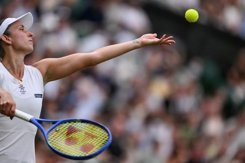 Belgium's Elise Mertens serves to Belarus's Aryna Sabalenka during their women's singles fourth round tennis match on the seventh day of the 2025 Wimbledon Championships at The All England Lawn Tennis and Croquet Club in Wimbledon, southwest London, on July 6, 2025.  Kirill KUDRYAVTSEV / AFP