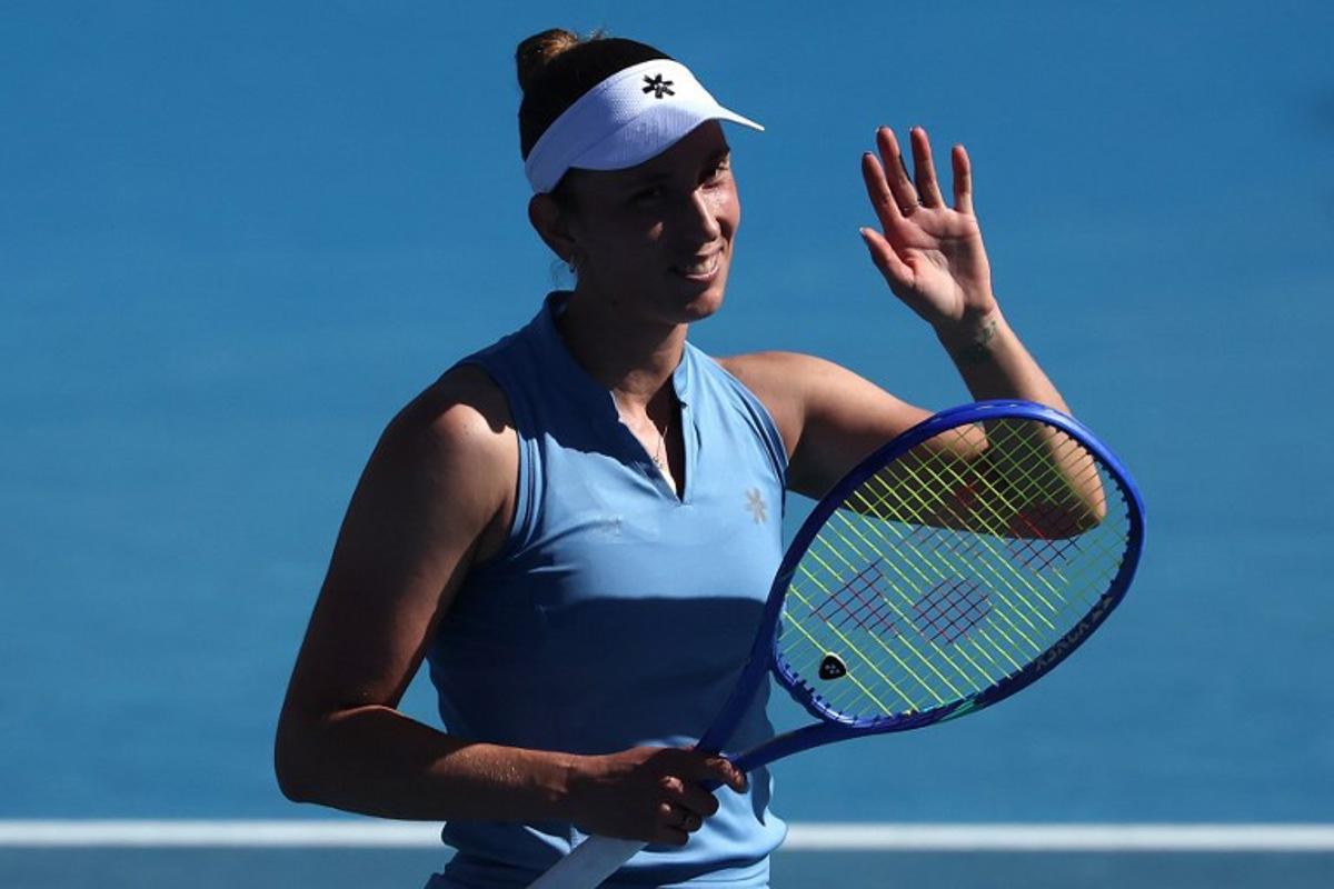 Belgium's Elise Mertens celebrates victory over Japan's Moyuka Uchijima after their women's singles match on day five of the Australian Open tennis tournament in Melbourne on January 22, 2026.  Martin KEEP / AFP