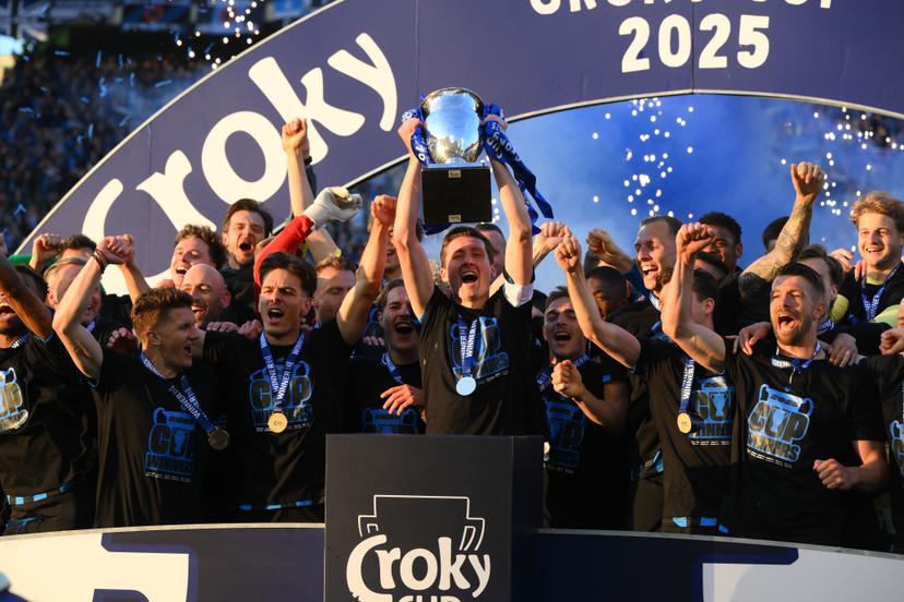 Club's players celebrate on the podium after winning a soccer game between Club Brugge and RSC Anderlecht in Brussels, Sunday 04 May 2025, the final of the 'Croky Cup' Belgian soccer cup. BELGA PHOTO JOHN THYS