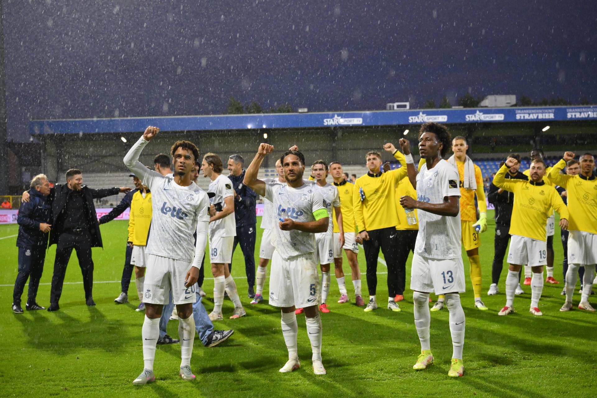 Union's Marc Giger, Union's Kevin Mac Allister and Union's Kevin Rodriguez celebrate after a soccer match between FCV Dender EH and Royale Union Saint-Gilloise, Saturday 13 September 2025 in Denderleeuw, on day 7 of the 2025-2026 'Jupiler Pro League' first division of the Belgian championship. BELGA PHOTO JOHN THYS