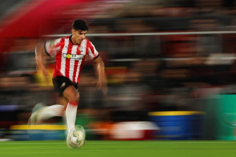 Southampton's Portuguese midfielder #18 Mateus Fernandes controls the ball during the English League Cup round of 16 football match  between Southampton and Stoke City at St Mary's Stadium in Southampton, southern England, on October 29, 2024.  Adrian Dennis / AFP