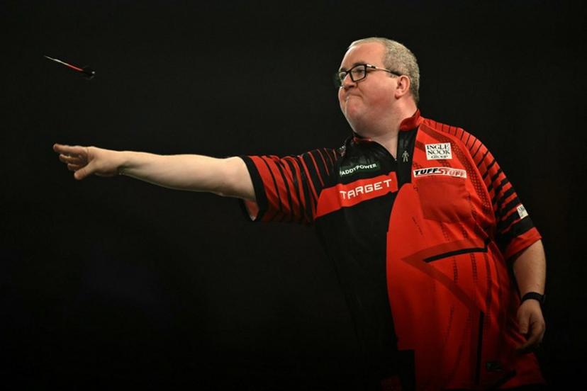 England's Stephen Bunting plays against England's Luke Littler during their PDC World Darts Championship semi-final at Alexandra Palace in London on January 2, 2025.  Ben STANSALL / AFP