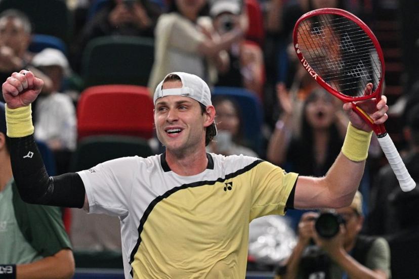 Belgium's Zizou Bergs celebrates after winning against Spain's Carlos Alcaraz during their men's singles match at the Shanghai Masters tennis tournament in Shanghai on October 12, 2026.  Hector RETAMAL / AFP