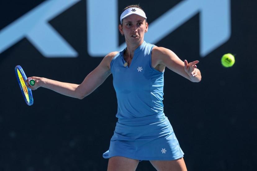 Belgium's Elise Mertens hits a shot against Japan's Moyuka Uchijima during their women's singles match on day five of the Australian Open tennis tournament in Melbourne on January 22, 2026.  IZHAR KHAN / AFP