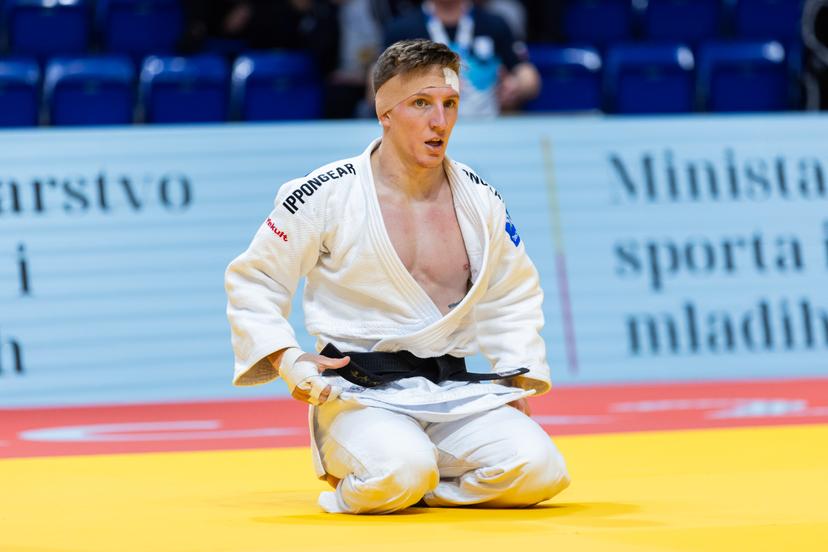 Belgian Jorre Verstraeten (white gi) combats Slovenian Starkel in a bout in the Men's -60kg category, at the European Championships judo in Podgorica, Montenegro, on Wednesday 23 April 2025. The tournament is taking place from 23 tot 27 April 2025. BELGA PHOTO NIKOLA KRISTC