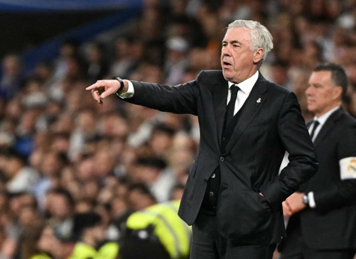 Real Madrid's Italian coach Carlo Ancelotti gestures on the touchline during the Spanish Copa del Rey (King's Cup) semi-final second leg football match between Real Madrid CF and Real Sociedad at the Santiago Bernabeu stadium in Madrid on April 1, 2025.  JAVIER SORIANO / AFP