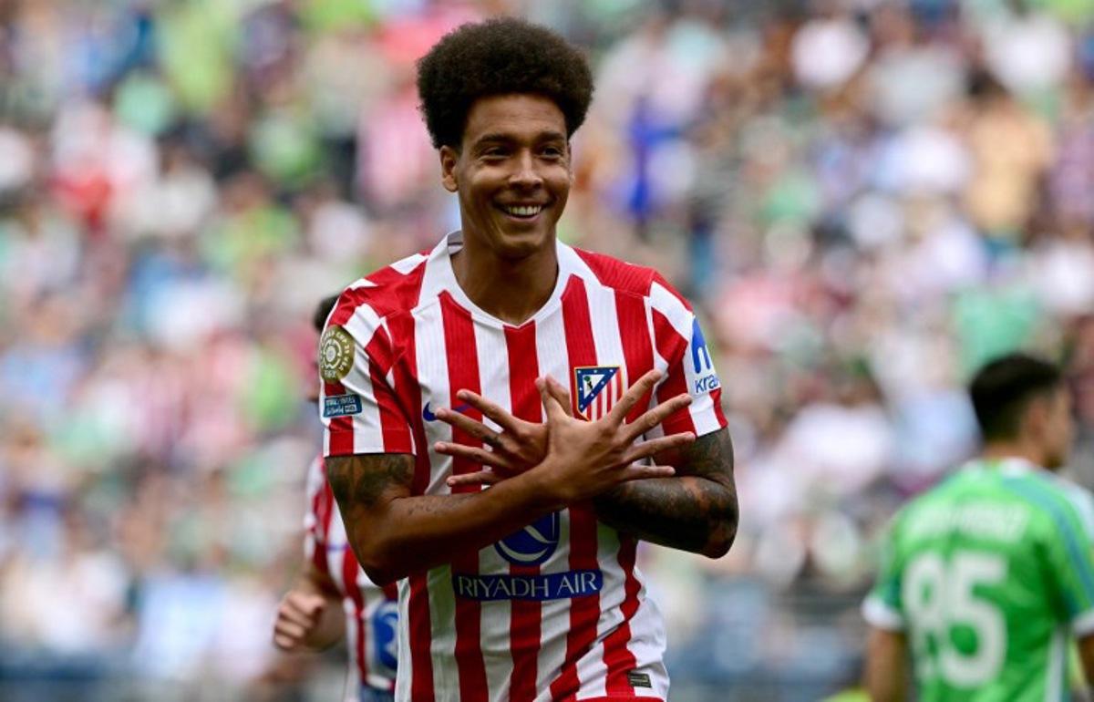 Atletico Madrid's Belgian midfielder #20 Axel Witsel celebrates scoring his team's second goal during the FIFA Club World Cup 2025 Group B football match between US Seattle Sounders and Spain's Atletico de Madrid at the Lumen Field stadium in Seattle on June 19, 2025.  Pablo PORCIUNCULA / AFP