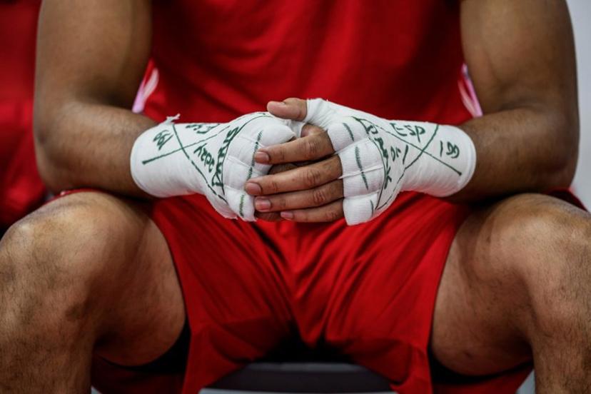 Spain's Enmanuel Reyes Pla prepares before competing against Azerbaijan's Loren Berto Alfonso Dominguez (Blue)  in the men's 92kg semi-final boxing match during the Paris 2024 Olympic Games at the North Paris Arena, in Villepinte on August 4, 2024.   JEFF PACHOUD / AFP