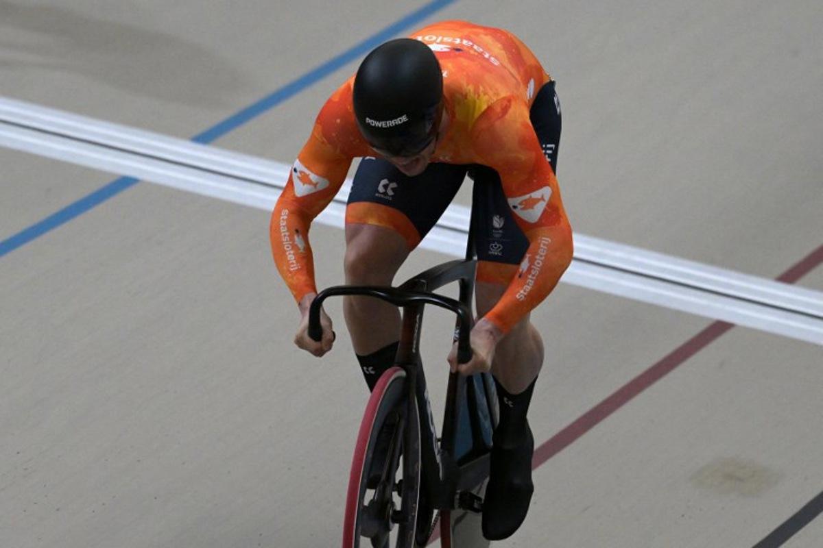 Netherlands' #168 Harrie Lavreysen competes in the first race of the men's sprint final at the 2025 UCI Track World Championships, in the Penalolen Velodrome in Santiago, on October 26, 2025.  Rodrigo ARANGUA / AFP