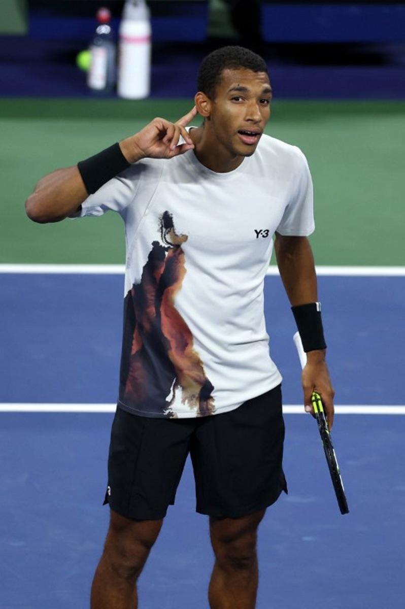 Canada's Felix Auger-Aliassime celebrates his victory over Germany's Alexander Zverev during their men's singles third round match on day seven of the US Open tennis tournament at the USTA Billie Jean King National Tennis Center in New York City, on August 30, 2025.  CHARLY TRIBALLEAU / AFP