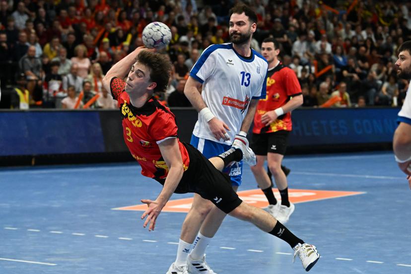 Belgium's Dree Riske and Greek Stefanos Michalidis pictured in action during a handball game between Belgian national team 'Red Wolves' and Greece, Saturday 21 March 2026 in Hasselt, fase 2 the qualifications for the men's 2027 World Championship. BELGA PHOTO JILL DELSAUX