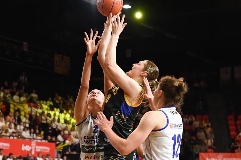 Mechelen's Cate Reese, Castors' Lin Schwarz and Mechelen's Heleen Nauwelaers pictured in action during a basketball match between Kangoeroes Mechelen and Castors Braine, Saturday 08 March 2025 in Oostende, the final of the women's Belgian Basketball Cup. BELGA PHOTO JILL DELSAUX