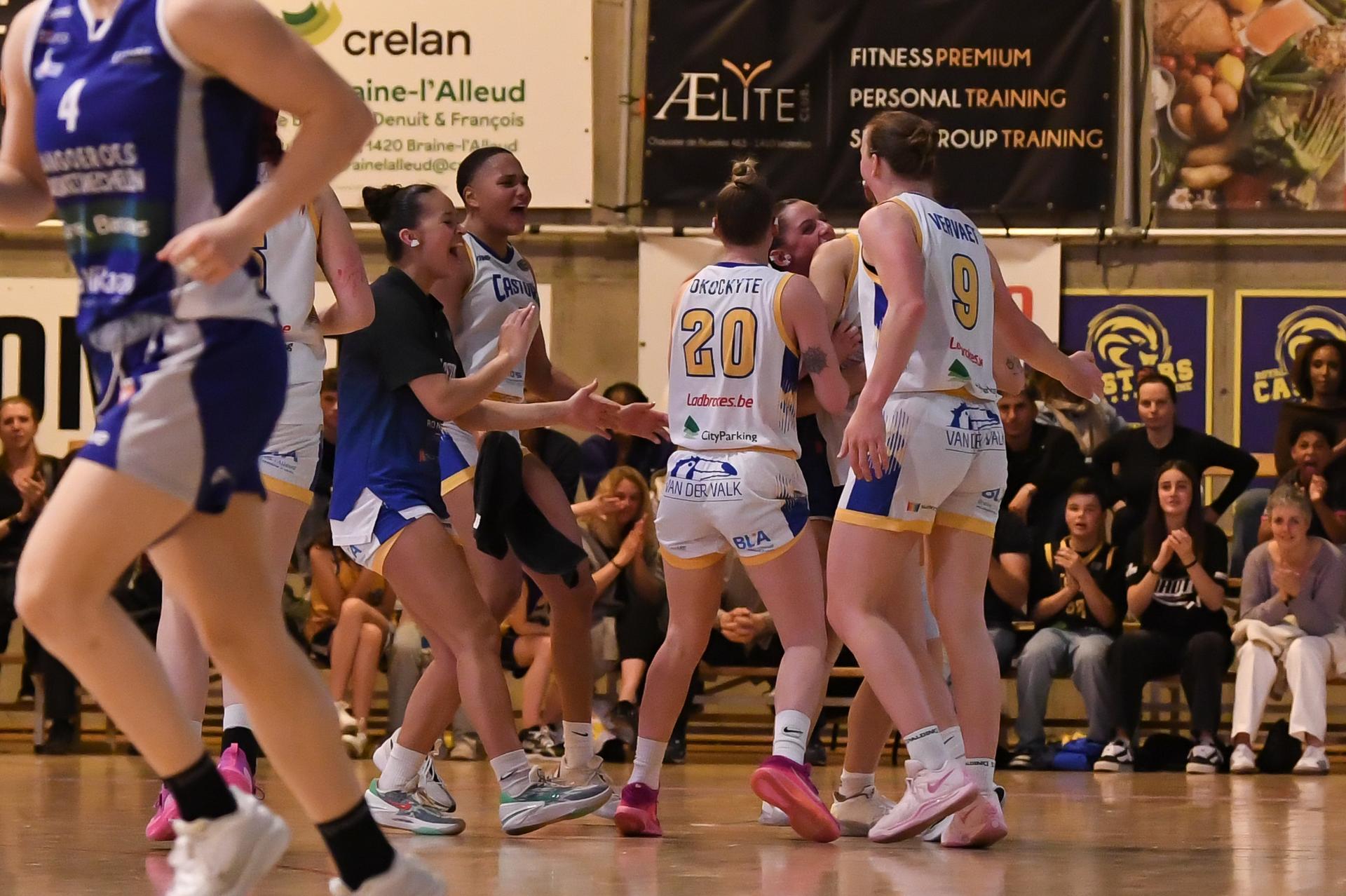 Castors' players celebrate during a basketball match between Royal Castors Braine and Kangoeroes Mechelen, Tuesday 22 April 2025, in Braine-l'Alleud, a 3rd leg best-of-3 game in the play-offs finals of the Women's Top Division Belgian basketball competition. BELGA PHOTO JILL DELSAUX