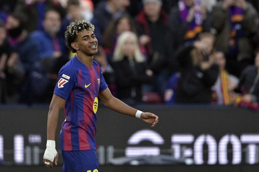 Barcelona's Spanish forward #10 Lamine Yamal celebrates scoring his third goal during the Spanish league football match between FC Barcelona and Villarreal CF at Camp Nou Stadium in Barcelona on February 28, 2026.  MANAURE QUINTERO / AFP