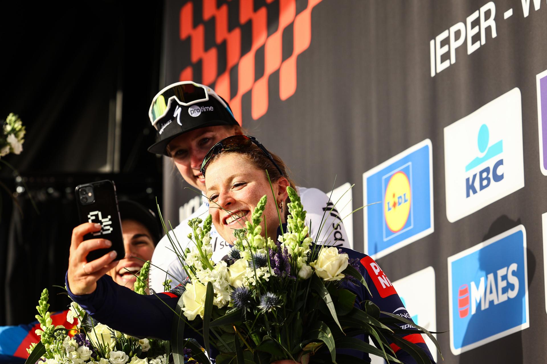Dutch Charlotte Kool of Team Picnic PostNL pictured on the podium after the women elite 'Gent-Wevelgem - In Flanders Fields' one day cycling race, 169.1 km from Ieper to Wevelgem, Sunday 30 March 2025. BELGA PHOTO DAVID PINTENS