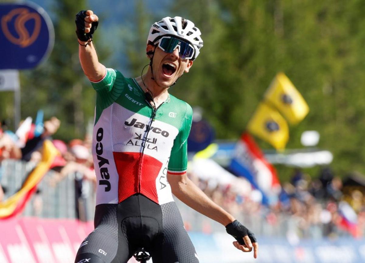 Team Jayco AlUla's Filippo Zana rider Filippo Zana celebrates as he wins the eighteenth stage of the Giro d'Italia 2023 cycling race, 161 km between Oderzo and Val di Zoldo, on May 25, 2023. . Luca BETTINI / AFP