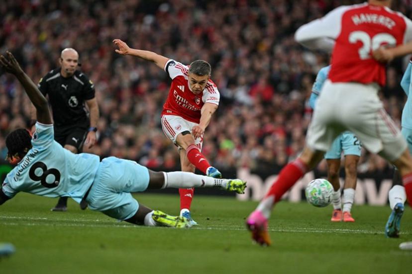 Arsenal's Belgian midfielder #19 Leandro Trossard shoots but fails to score during the English Premier League football match between Arsenal and Burnley at the Emirates Stadium in London on May 18, 2026.   Glyn KIRK / AFP