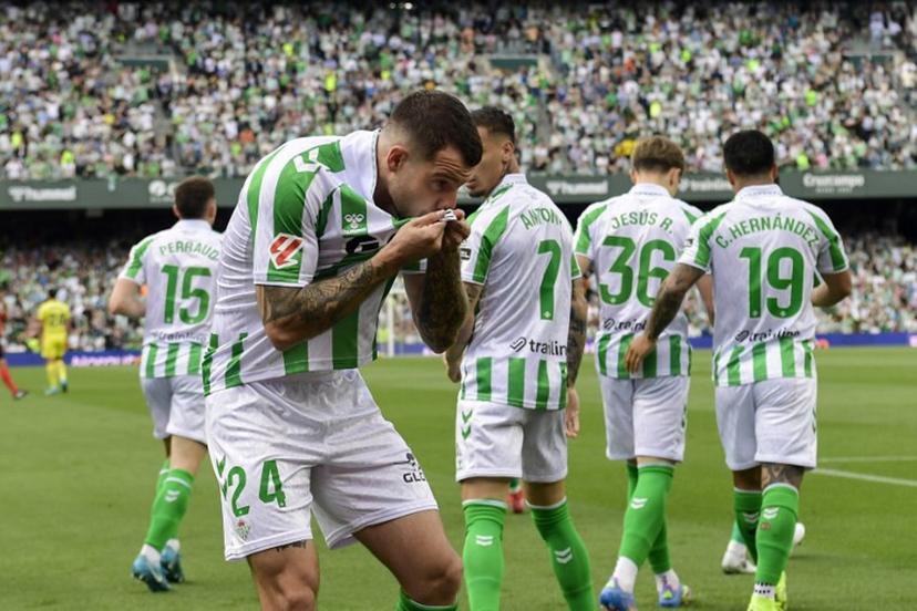 Real Betis' Spanish defender #24 Aitor Ruibal Garcia celebrates scoring their first goal during the Spanish league football match between Real Betis and Villarreal CF at the Benito Villamarin stadium in Seville on April 13, 2025.  CRISTINA QUICLER / AFP