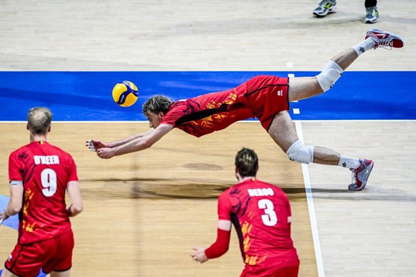 Belgium's Ferre Reggers dives for the ball against Italy during the 2025 Men's Volleyball World Championship at the Araneta Coliseum in Quezon City on September 16, 2025.  SHERWIN VARDELEON / AFP