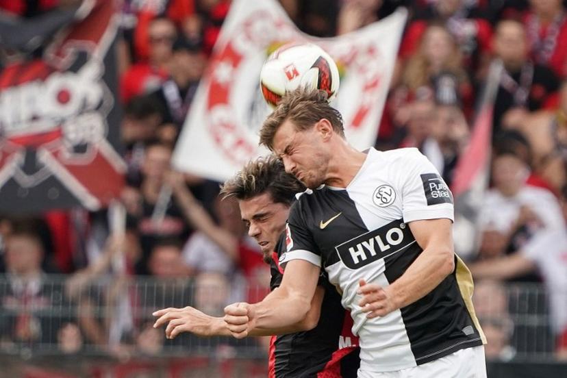 SV Elversberg's Bulgarian forward #25 Lukas Petkov and Bayer Leverkusen's Spanish defender #03 Miguel Gutierrez vie for the ball during the German first division Bundesliga football match between SV Elversberg and Bayer 04 Leverkusen at the Ursapharm Arena in Spiesen-Elversberg, southern Germany on August 29, 2026.  Andreas Schlichter / AFP