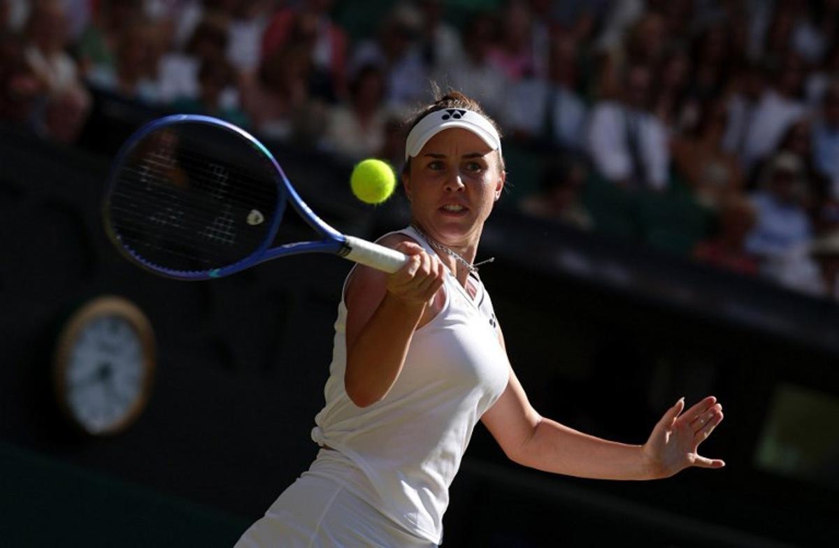 Czech Republic's Linda Noskova returns to Czech Republic's Karolina Muchova during their women's singles final tennis match on the thirteenth day of the 2026 Wimbledon Championships at The All England Lawn Tennis and Croquet Club in Wimbledon, southwest London, on July 11, 2026.  Adrian Dennis / AFP