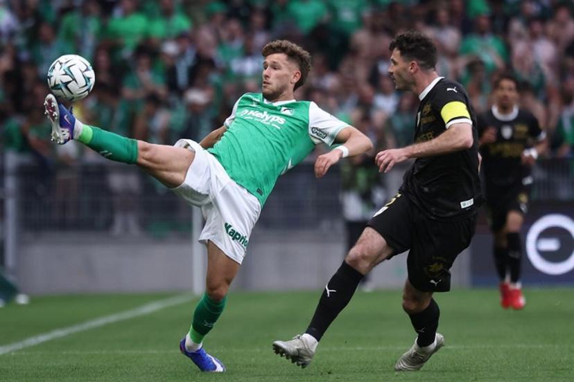Saint-Etienne's Belgium forward #09 Lucas Stassin (L) fights for the ball with Amiens' French midfielder #06 Thomas Monconduit during the French L2 football match between AS Saint-Etienne and Amiens SC at the stade Geoffroy Guichard in Saint-Etienne, south-eastern France on May 9, 2026. Following Troyes' promotion as Ligue 2 champions, there is just one direct promotion spot left to be claimed by three clubs - Le Mans, Saint-Etienne and Red Star - on the 34th and final matchday in the evening of May 9, 2026. Alex MARTIN / AFP