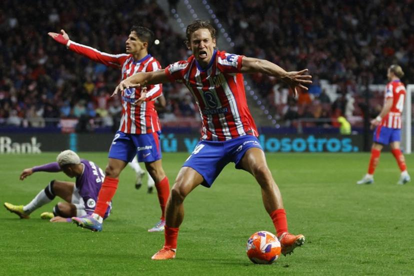 Atletico Madrid's Spanish midfielder #14 Marcos Llorente reacts during the Spanish league football match between Club Atletico de Madrid and Real Valladolid FC at Metropolitano Stadium in Madrid on April 14, 2025.  Pierre-Philippe MARCOU / AFP